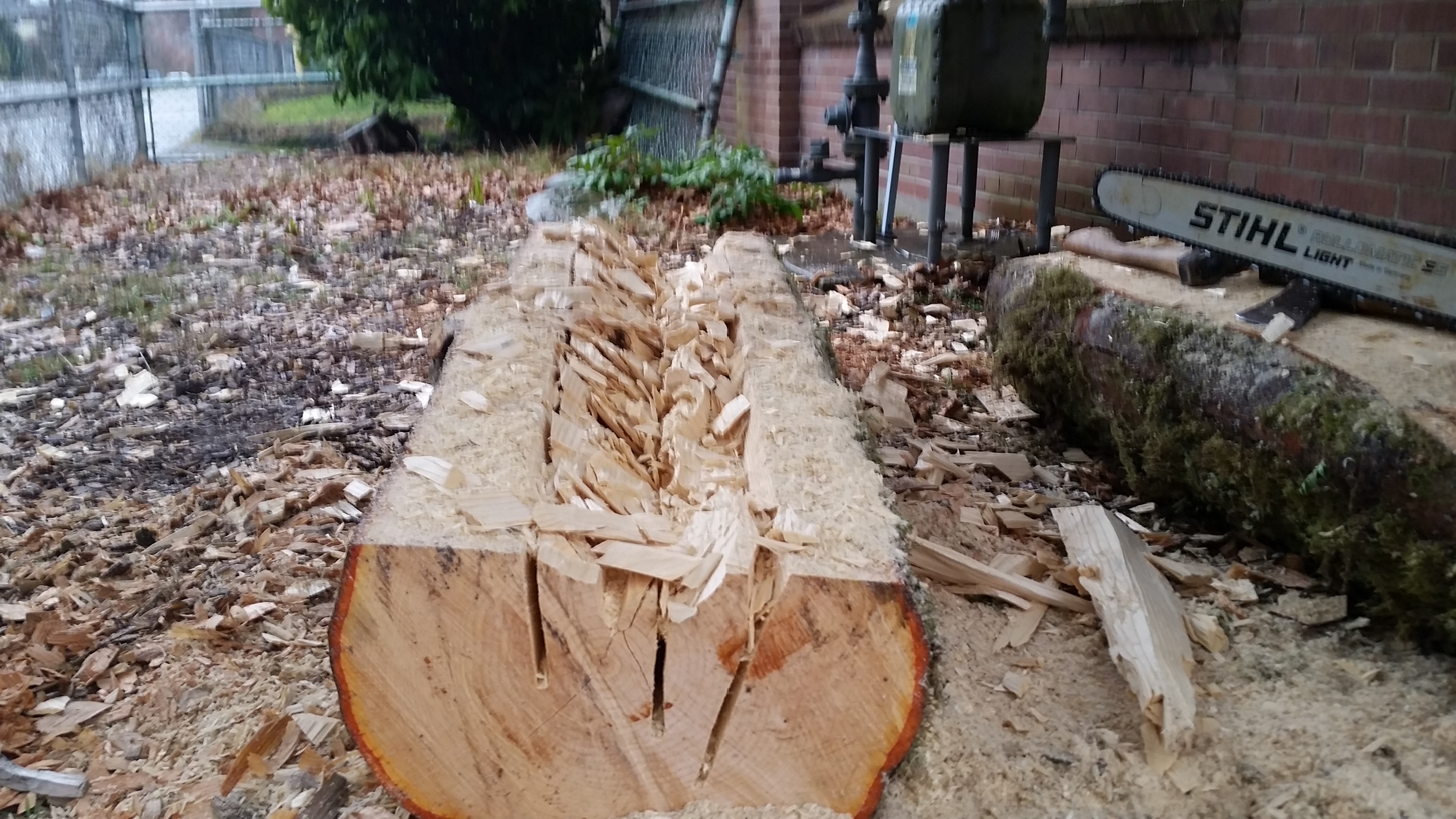 Chainsaw slits to hack out the wood easier